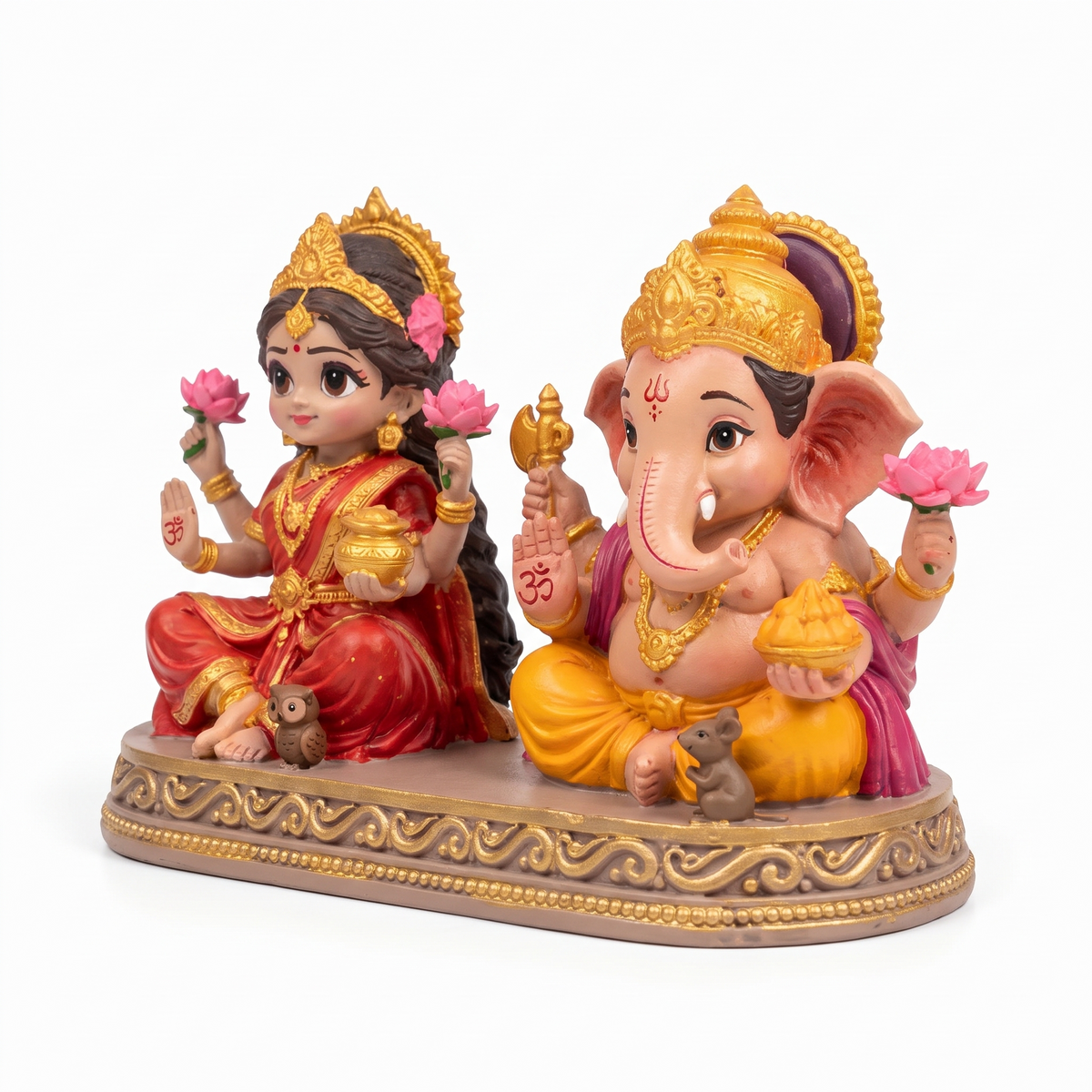 Laxmi Ganesh idol three-quarter view showing Lakshmi's owl, Ganesha's mouse and the gold-scroll base