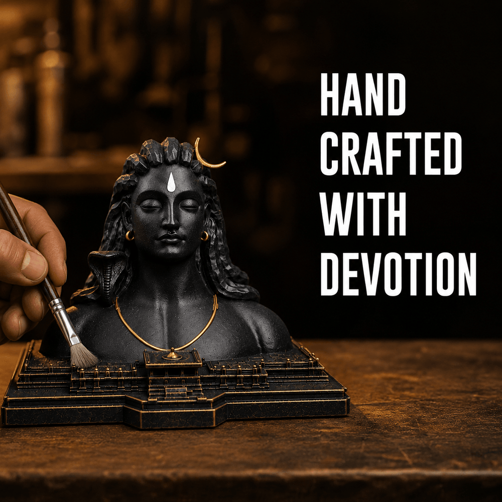 A brush touching up the detail on the Aadiyogi bust