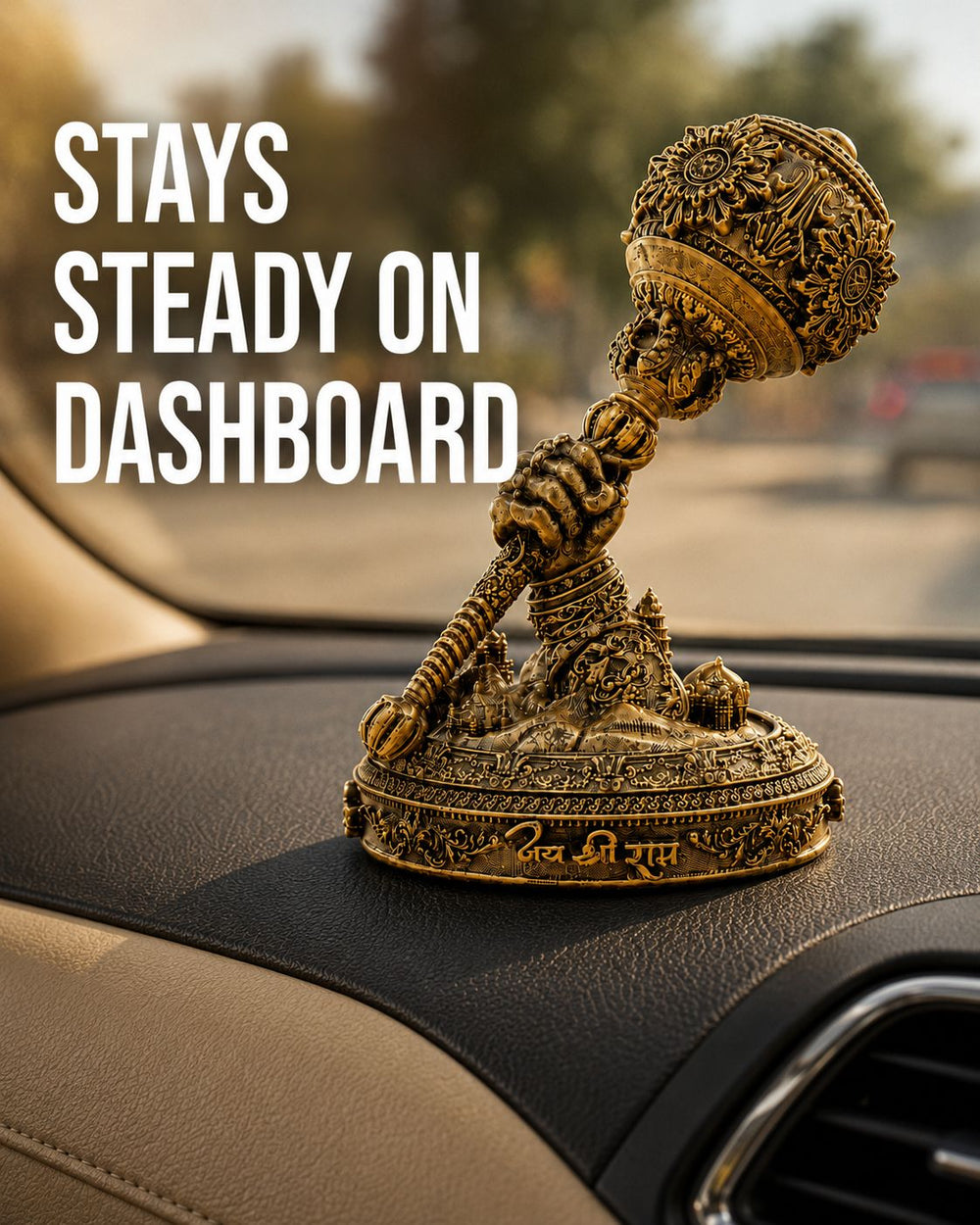 The Hanuman Gada idol on a car dashboard