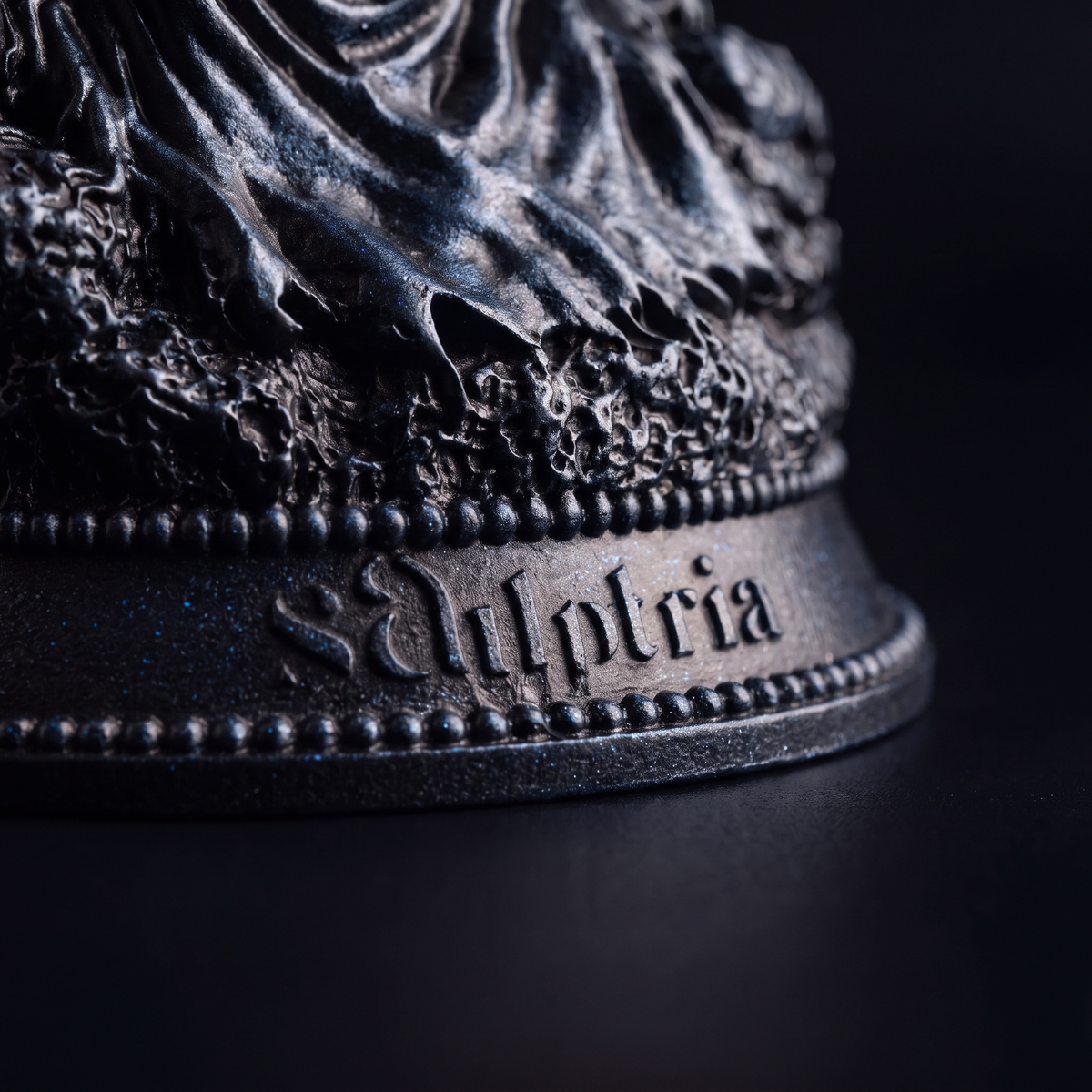 Black Edition base — the embossed Sculptria mark and beaded rim